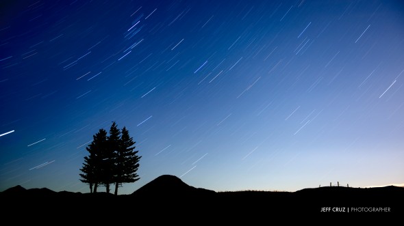 A free downloadable wallpaper image of long exposure star trails