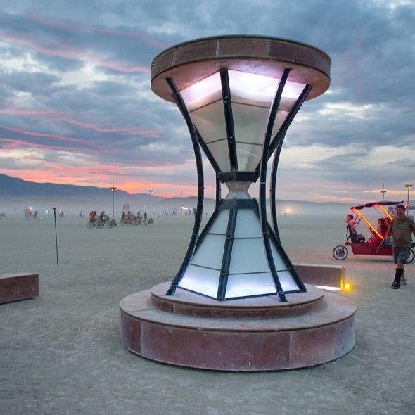 Chronosydra is a huge reverse hourglass that displays the passage of time on the Playa