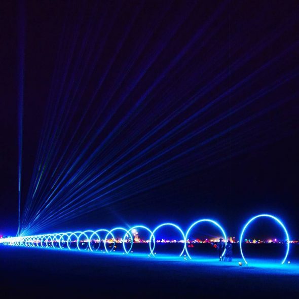 The Sonic Runway, my favourite installation this year.  32 separate rings of light that change colour depending on the music being played at the start of the line.  It would be in sync with how fast the music travels.